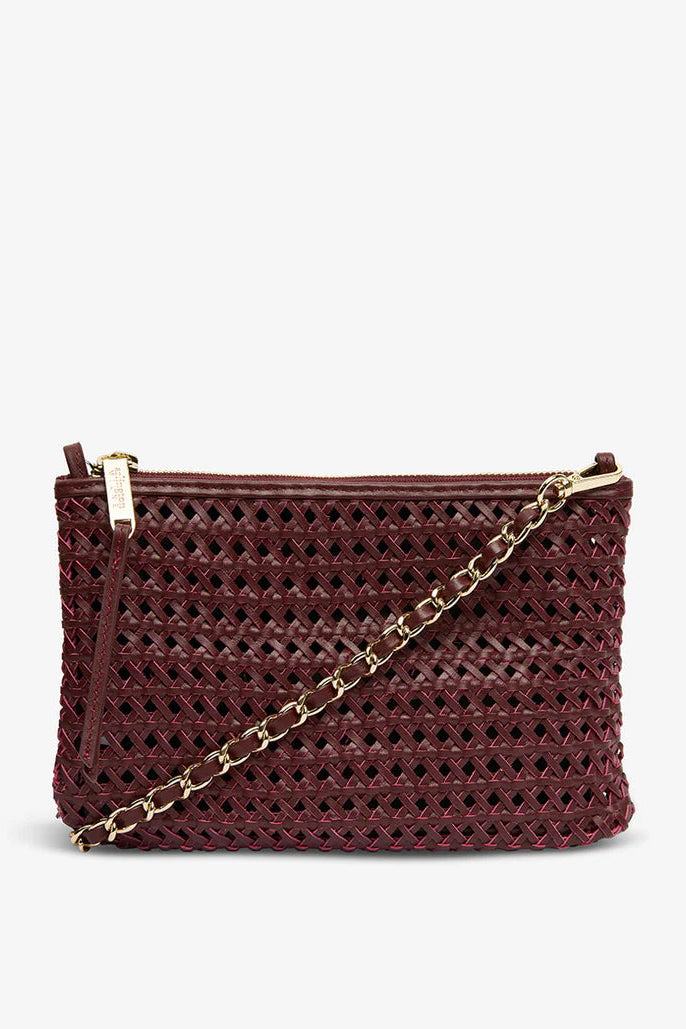 Woven handbag with gold chain strap on a white background
