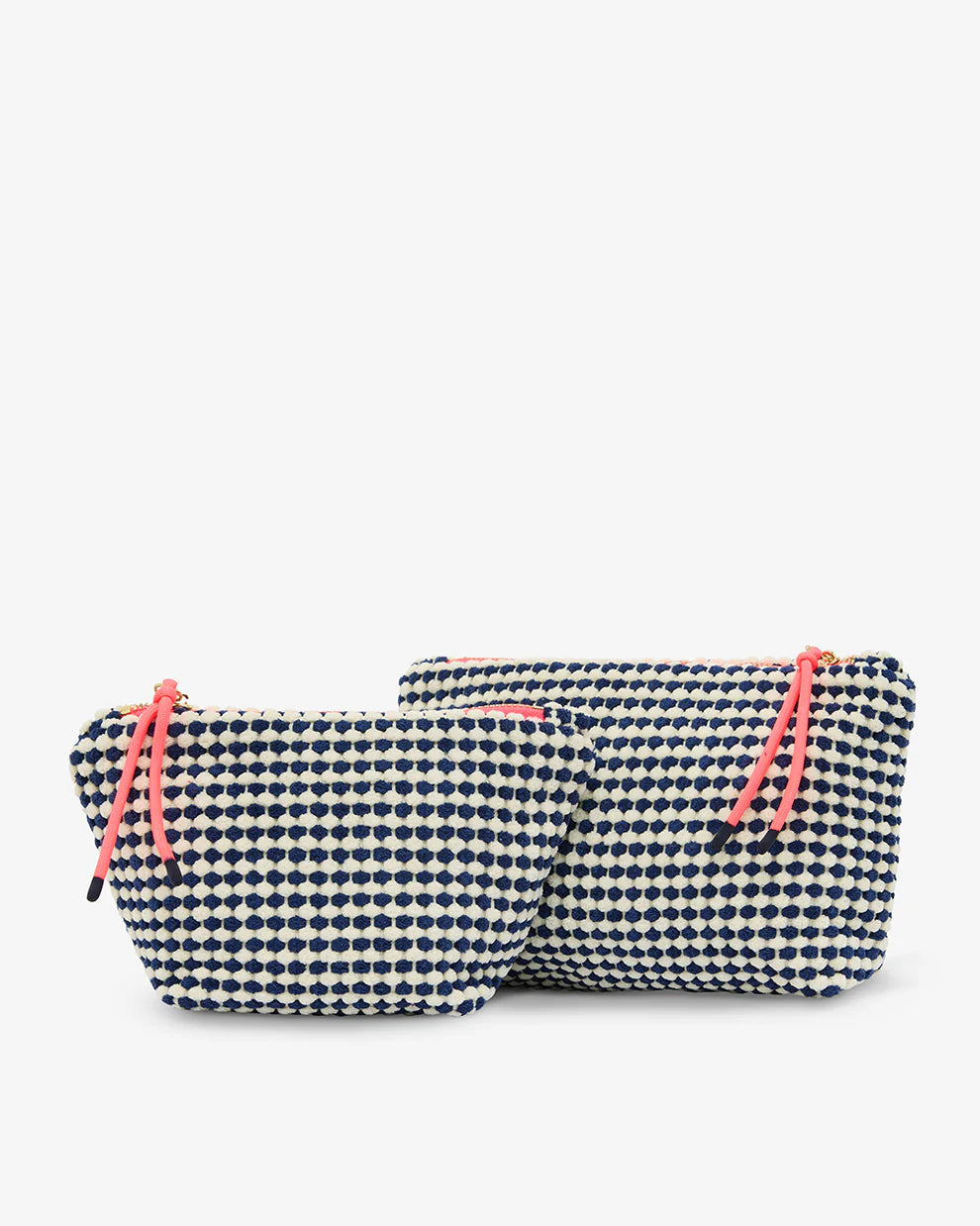 Two navy blue and white checkered pouches with pink zippers on a white background. Elms & King Napili Large Navy White