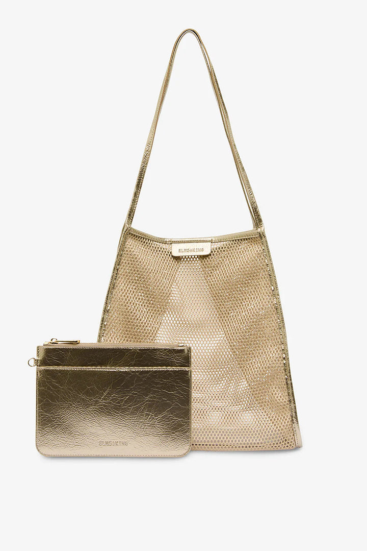 Gold woven handbag with matching pouch on a white background