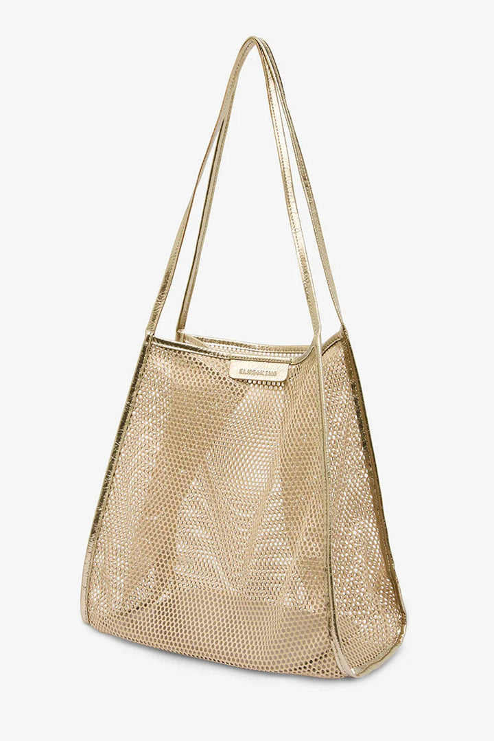 Gold mesh handbag on a light gray background