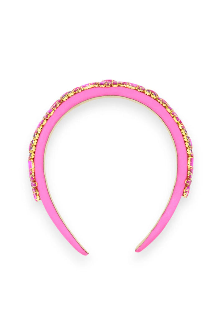 Pink headband with gold embellishments on a white background