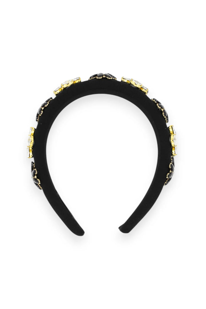 Black headband with gold accents on a white background