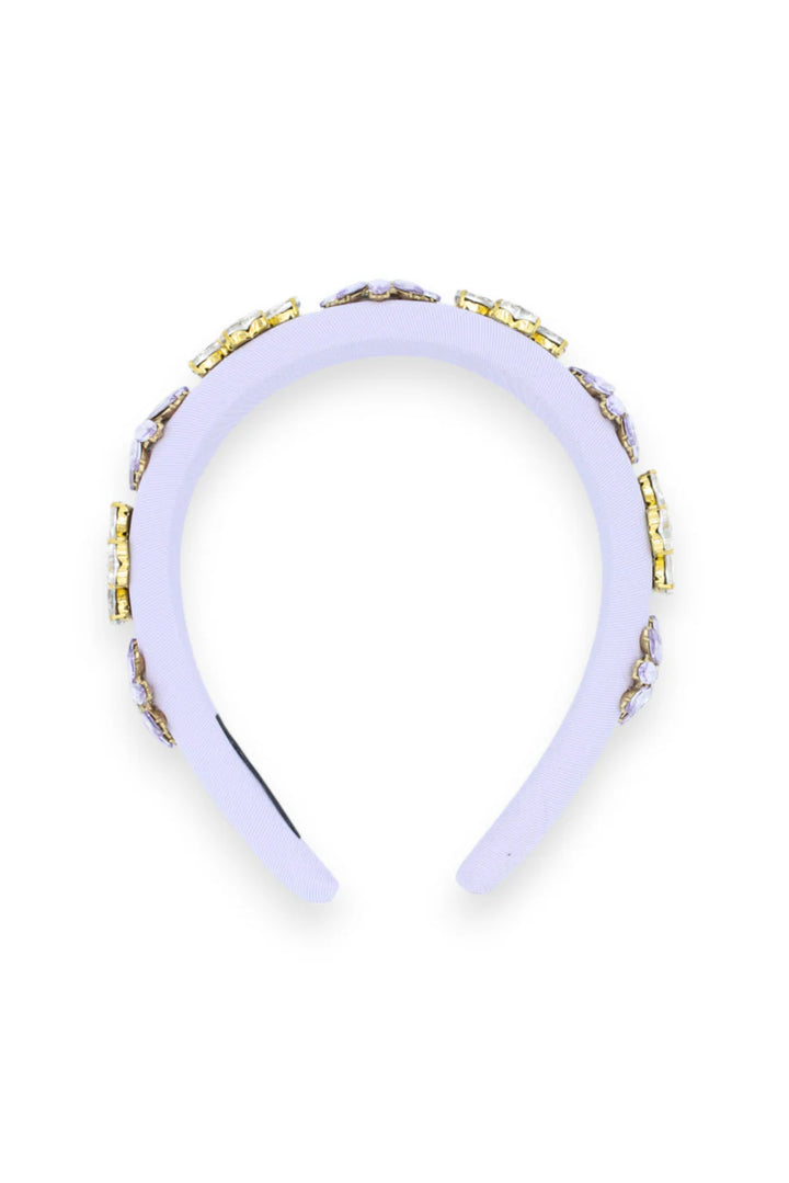 White headband with gold accents on a white background