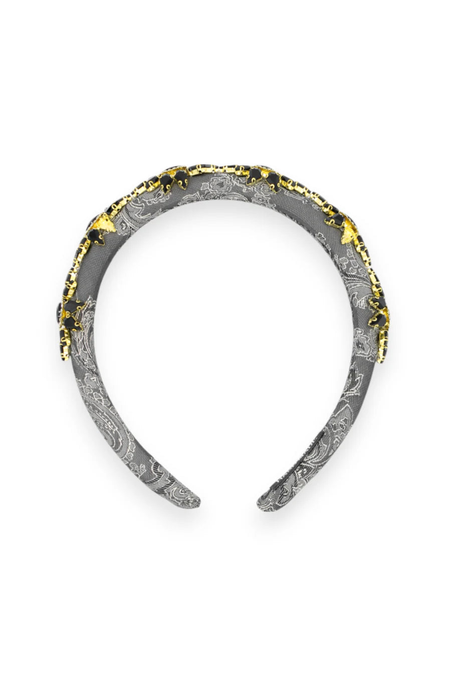 Decorative headband with textured design on a white background