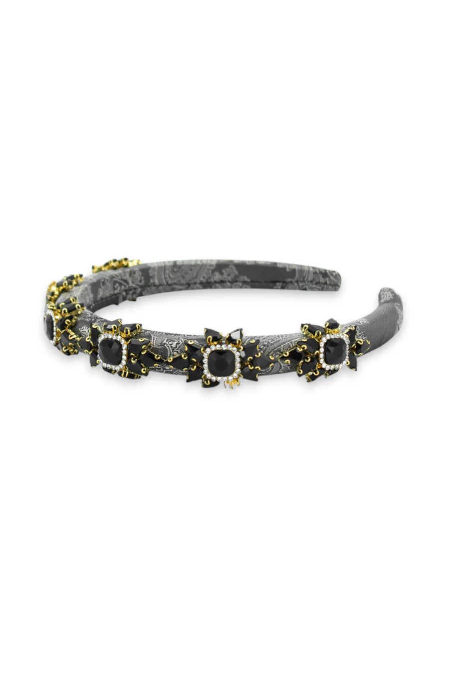 Decorative headband with black and gold accents on a white background