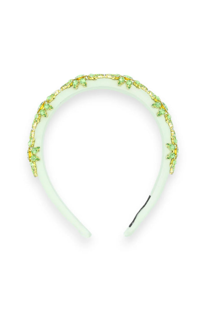 Green beaded headband on a white background