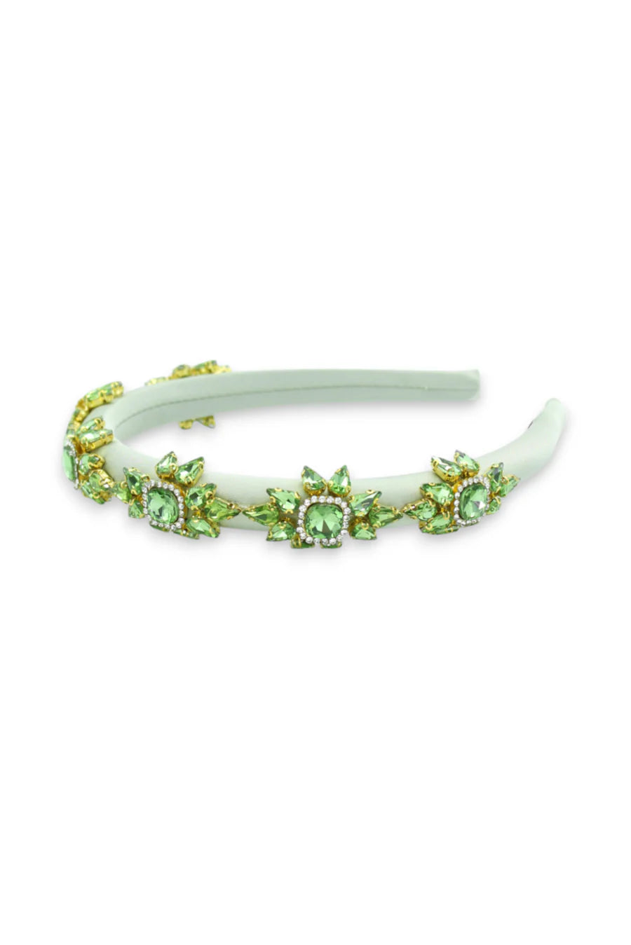 Decorative headband with green gemstones on a white background