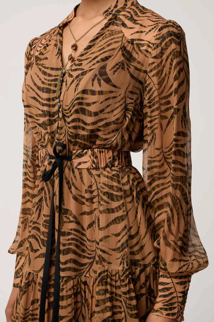 Brown dress with black animal print pattern on a white background