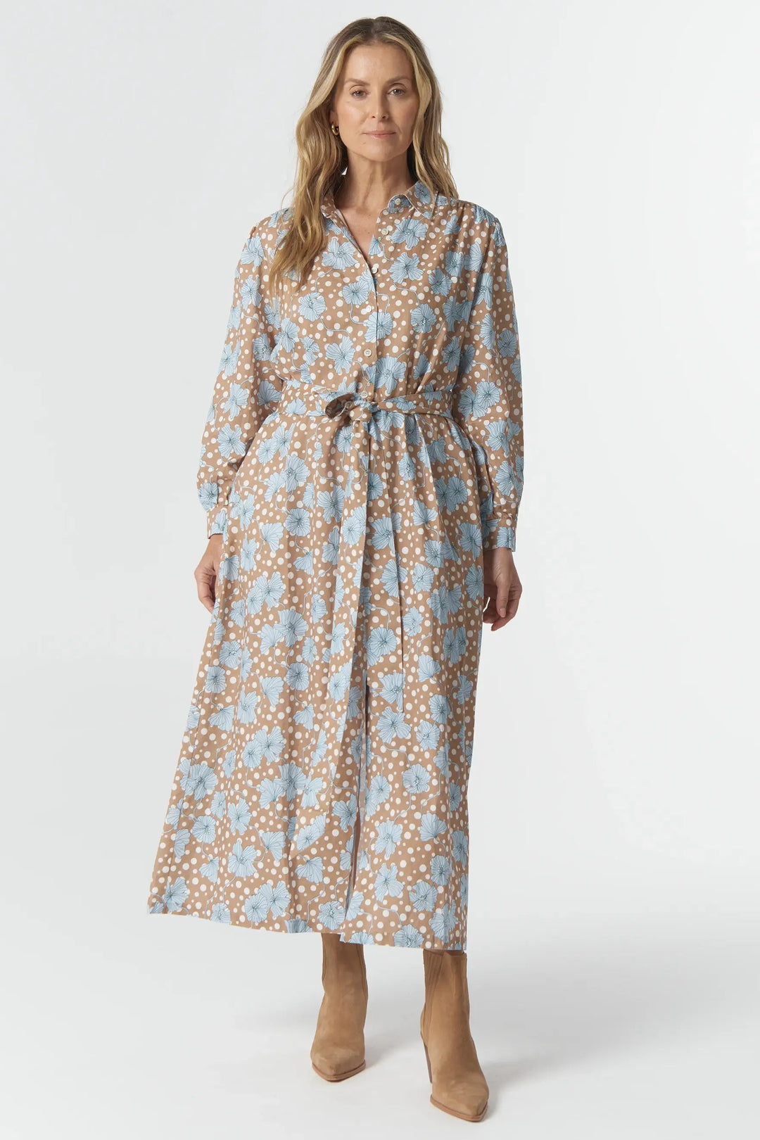 Woman wearing a floral dress on a white background