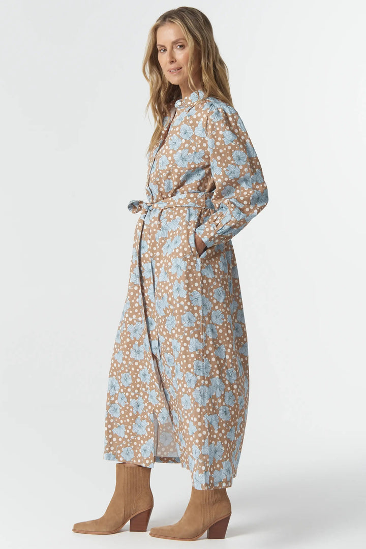 Woman wearing a floral dress on a white background