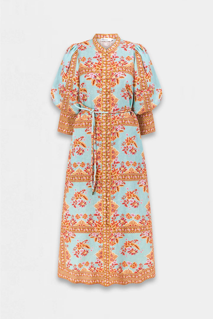 A light blue midi dress with a vibrant orange and pink floral pattern, featuring puff sleeves, a tie waist belt, and a high collar, shown against a plain light gray background.